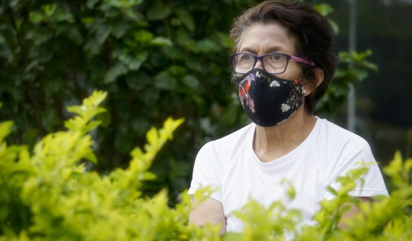 man in white crew neck t-shirt wearing black goggles